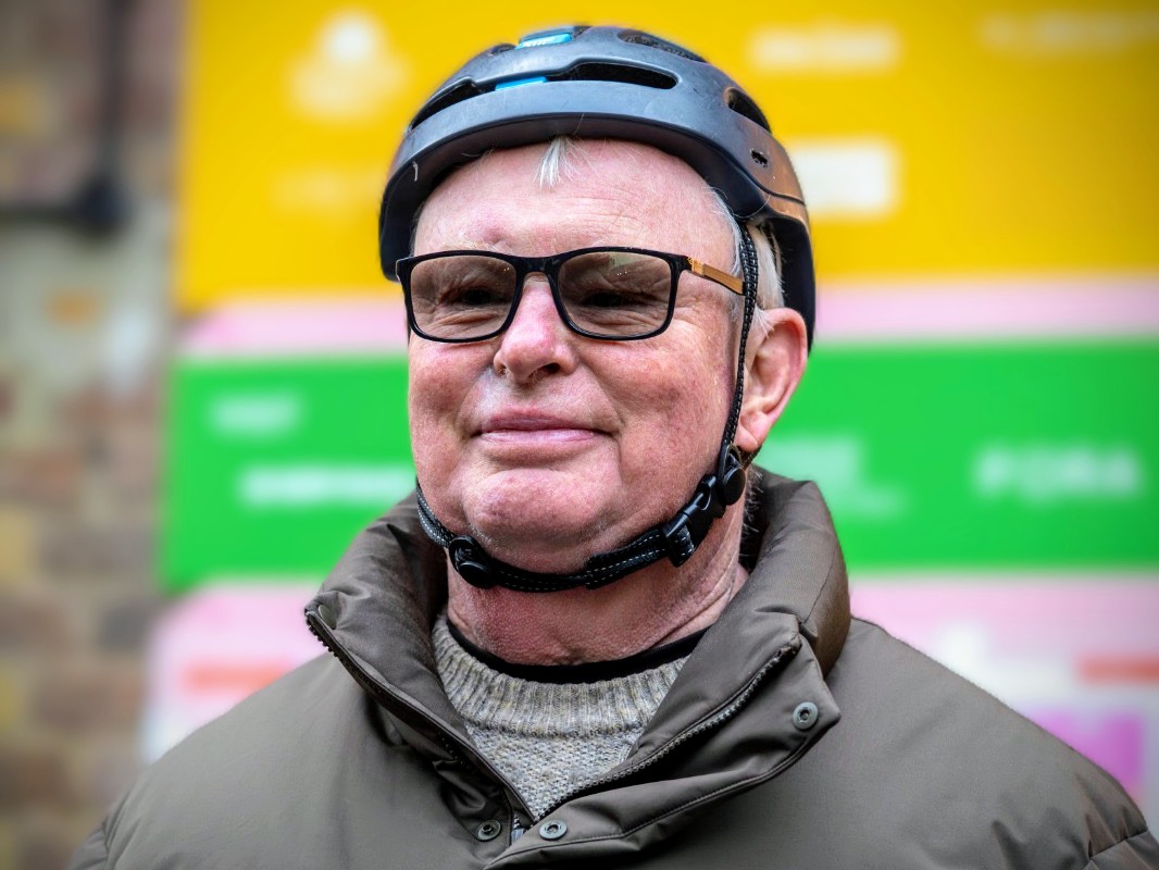 Rob with yellow and green background