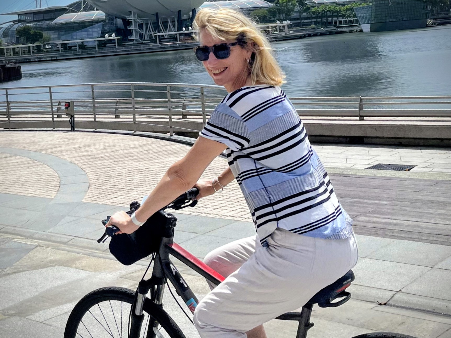 Corrine on a bike in Singapore
