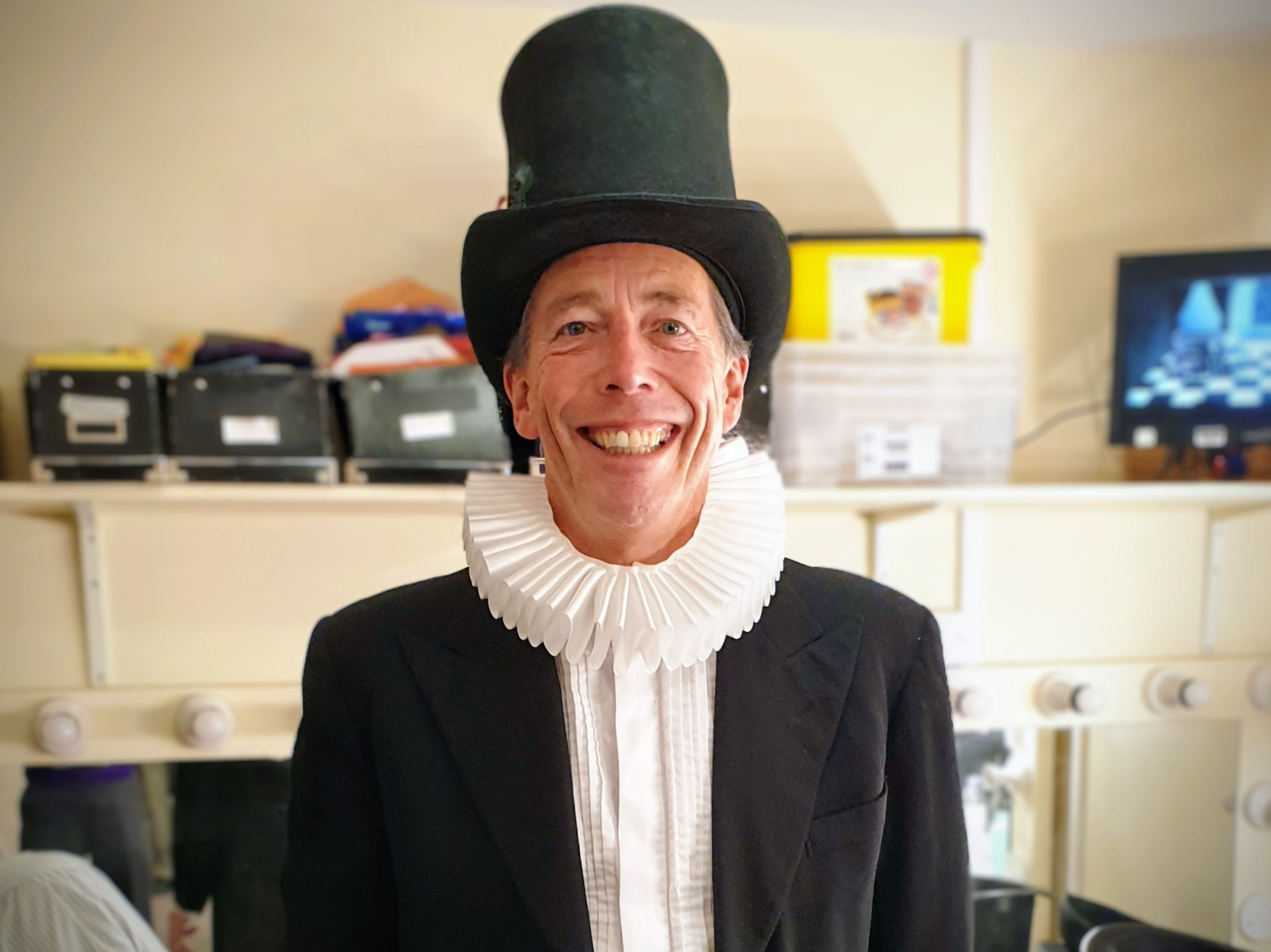 Ian with a top hat and fluff on