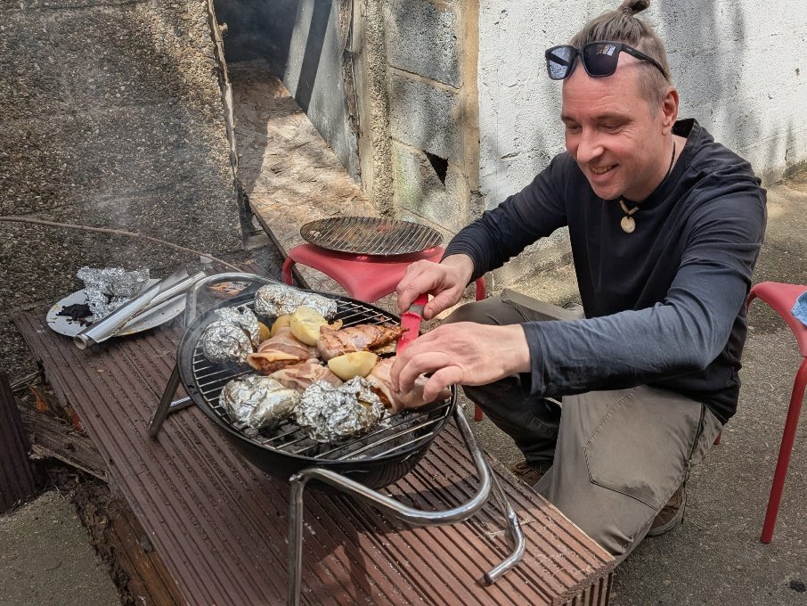 Janos cooking on a barbeue